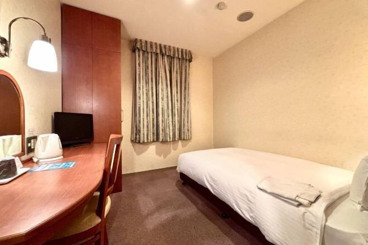 Fer et planche à repasser, Wi-Fi gratuit, draps fournis