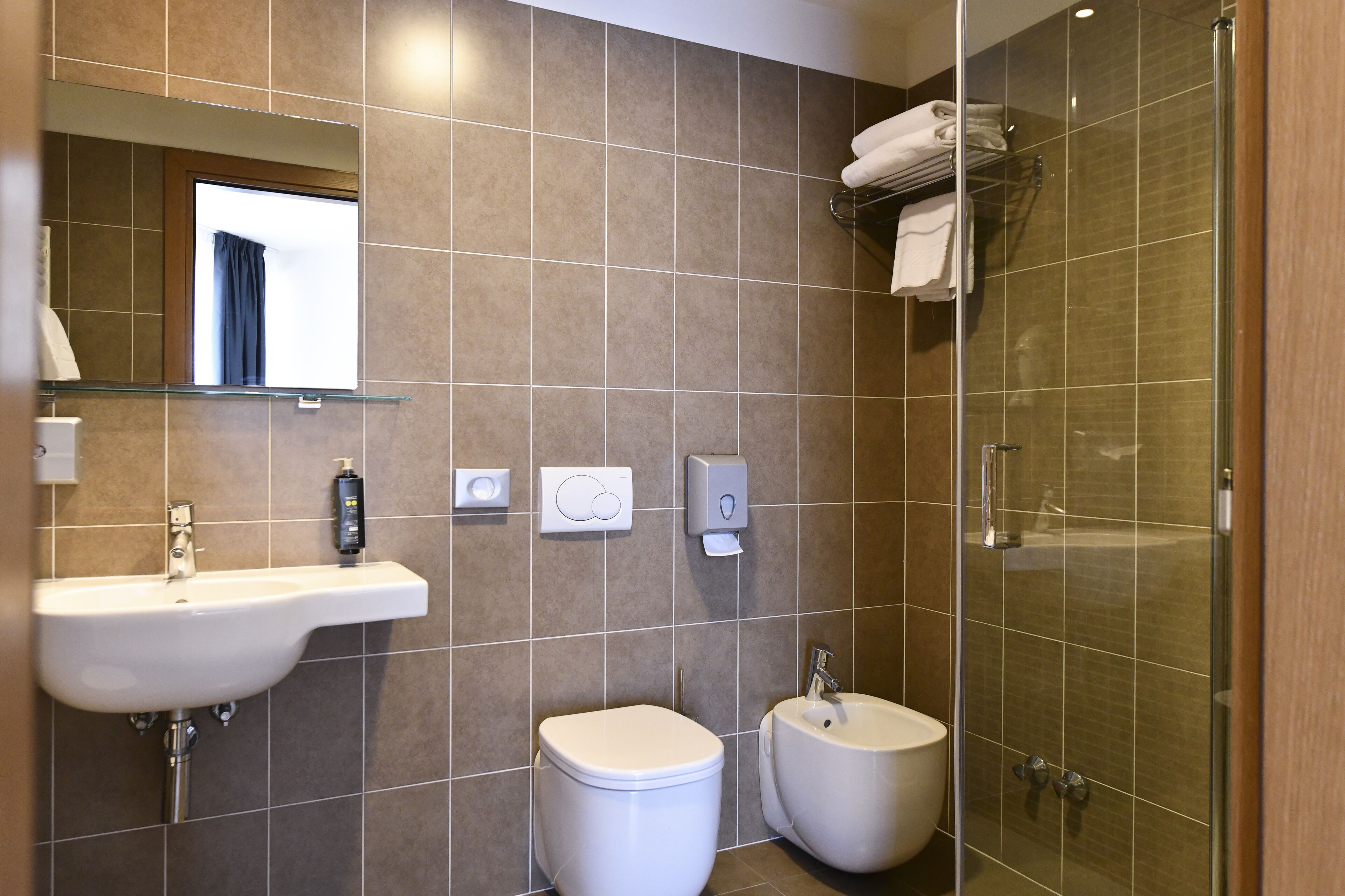 shower, free toiletries, hair dryer, bathrobes