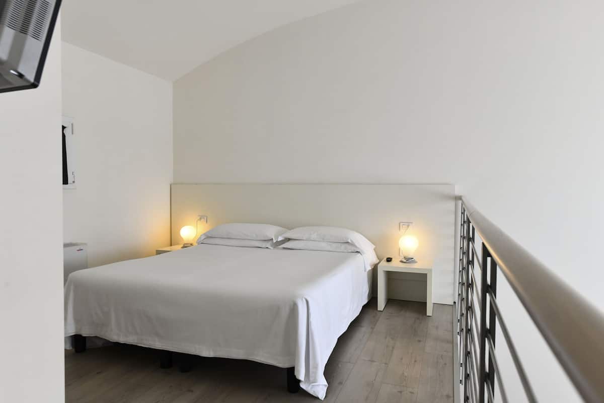 Duplex, Terrace | In-room safe, desk, blackout curtains, iron/ironing board