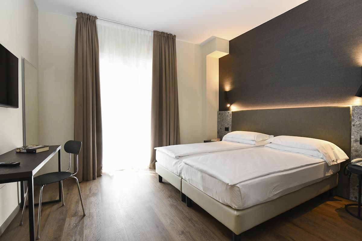 Superior Double Room, Balcony | In-room safe, desk, blackout curtains, iron/ironing board
