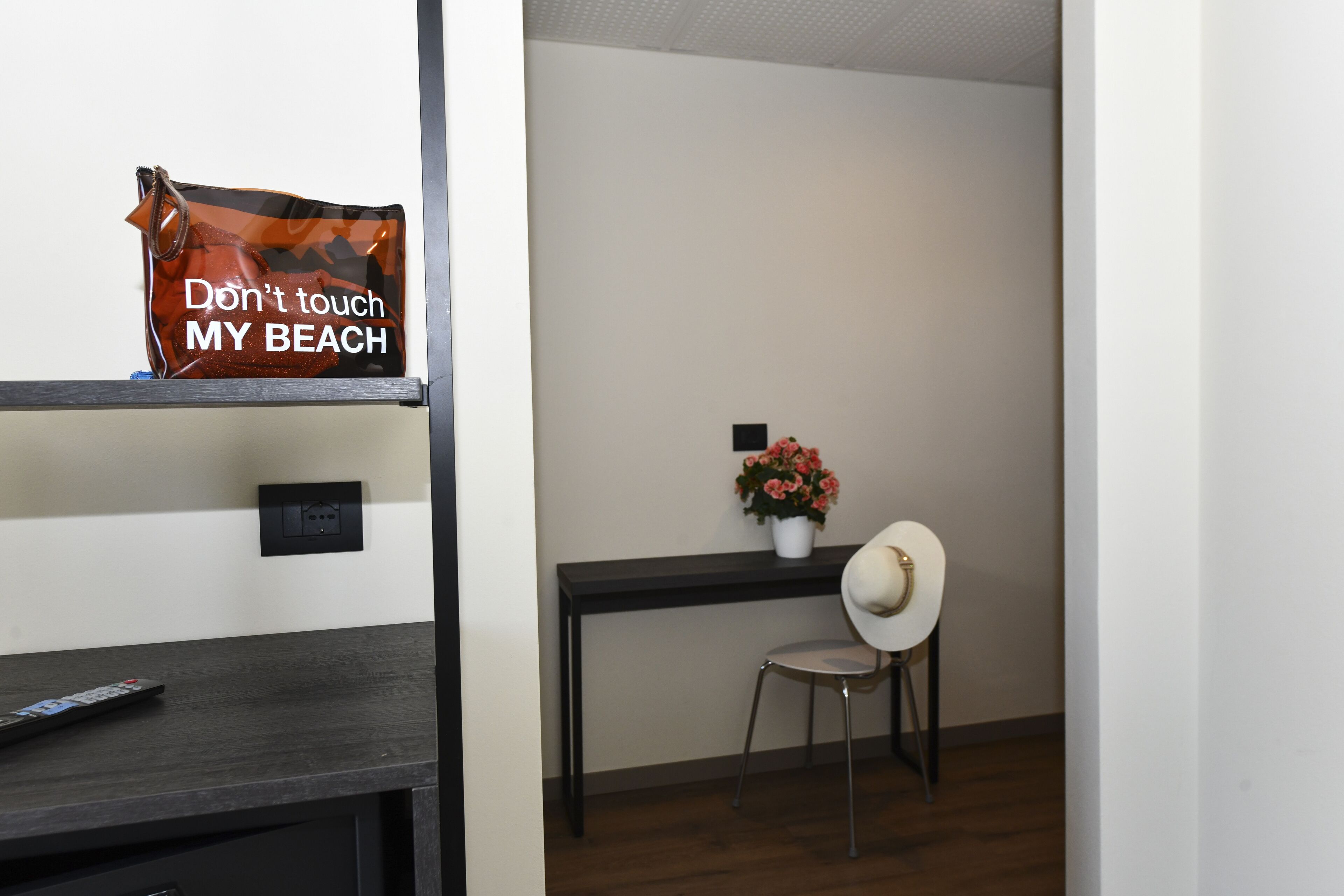 singola superior (no beach access included) | in-room safe, desk, blackout curtains, iron/ironing board