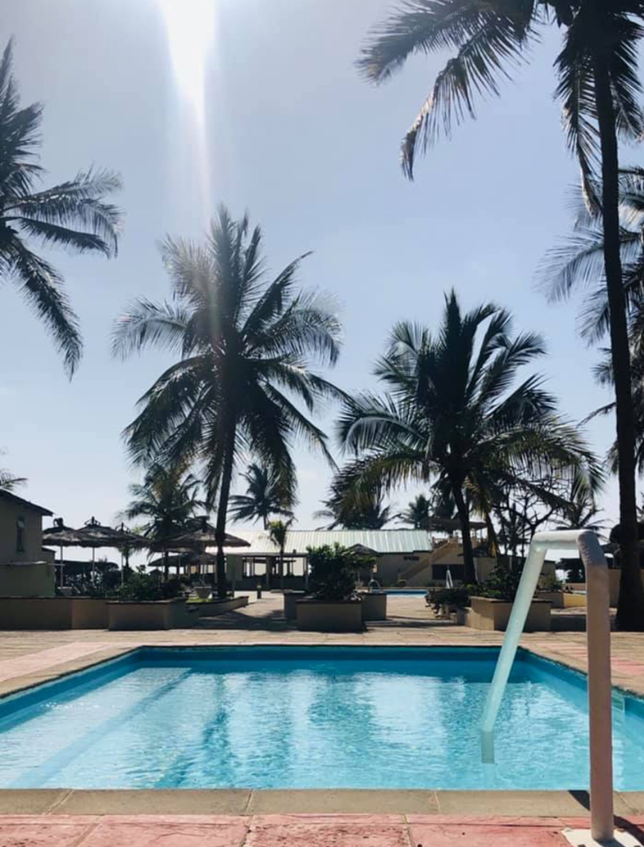 2 outdoor pools, open 7:30 am to 6:00 pm, pool umbrellas, pool loungers