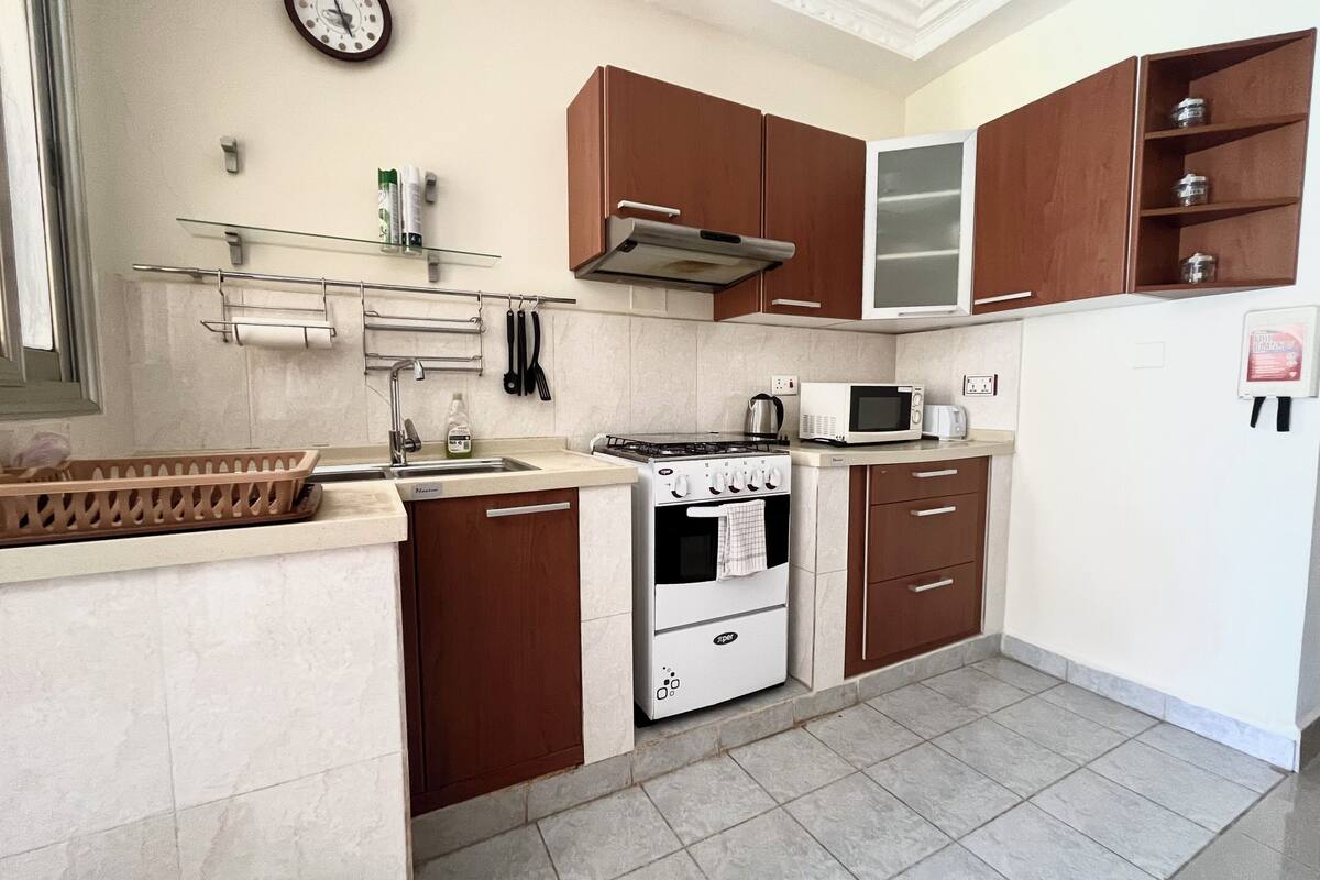 superior one apartment | private kitchen | microwave, coffee/tea maker, electric kettle, cookware/dishes/utensils