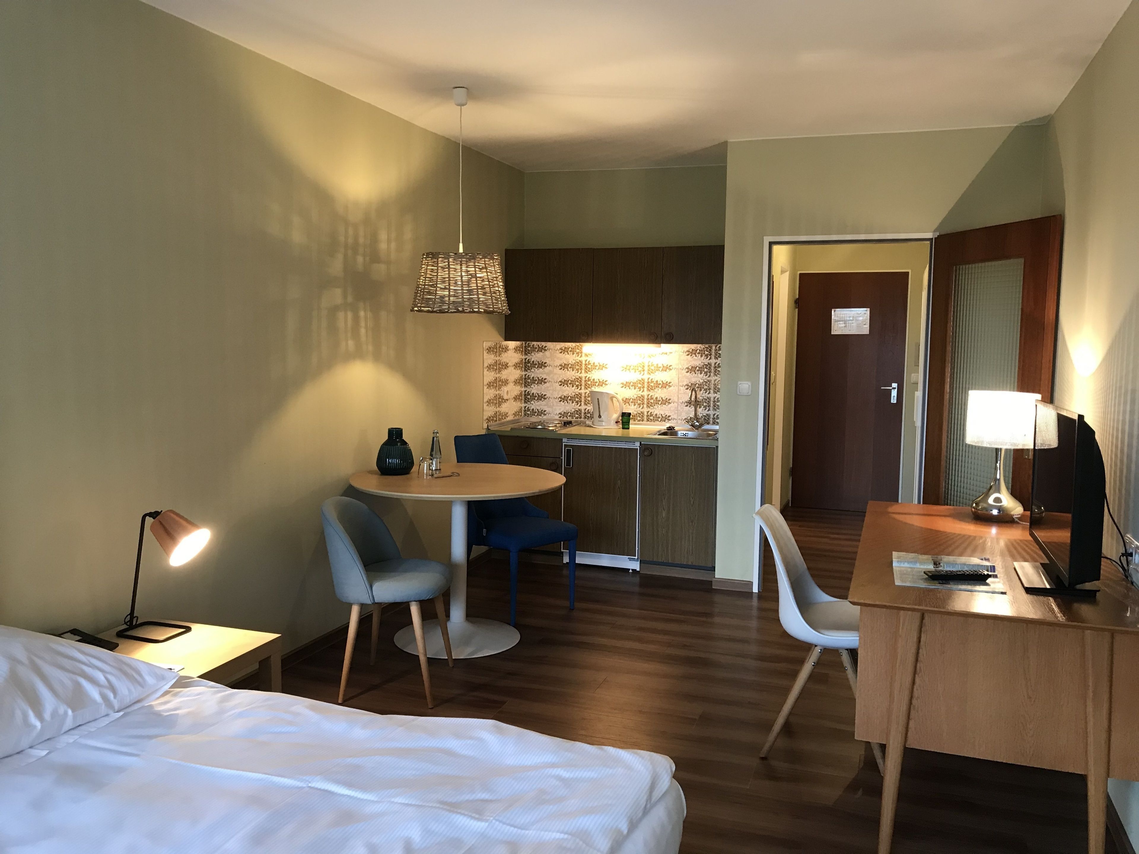 fridge, electric kettle, cookware/dishes/utensils