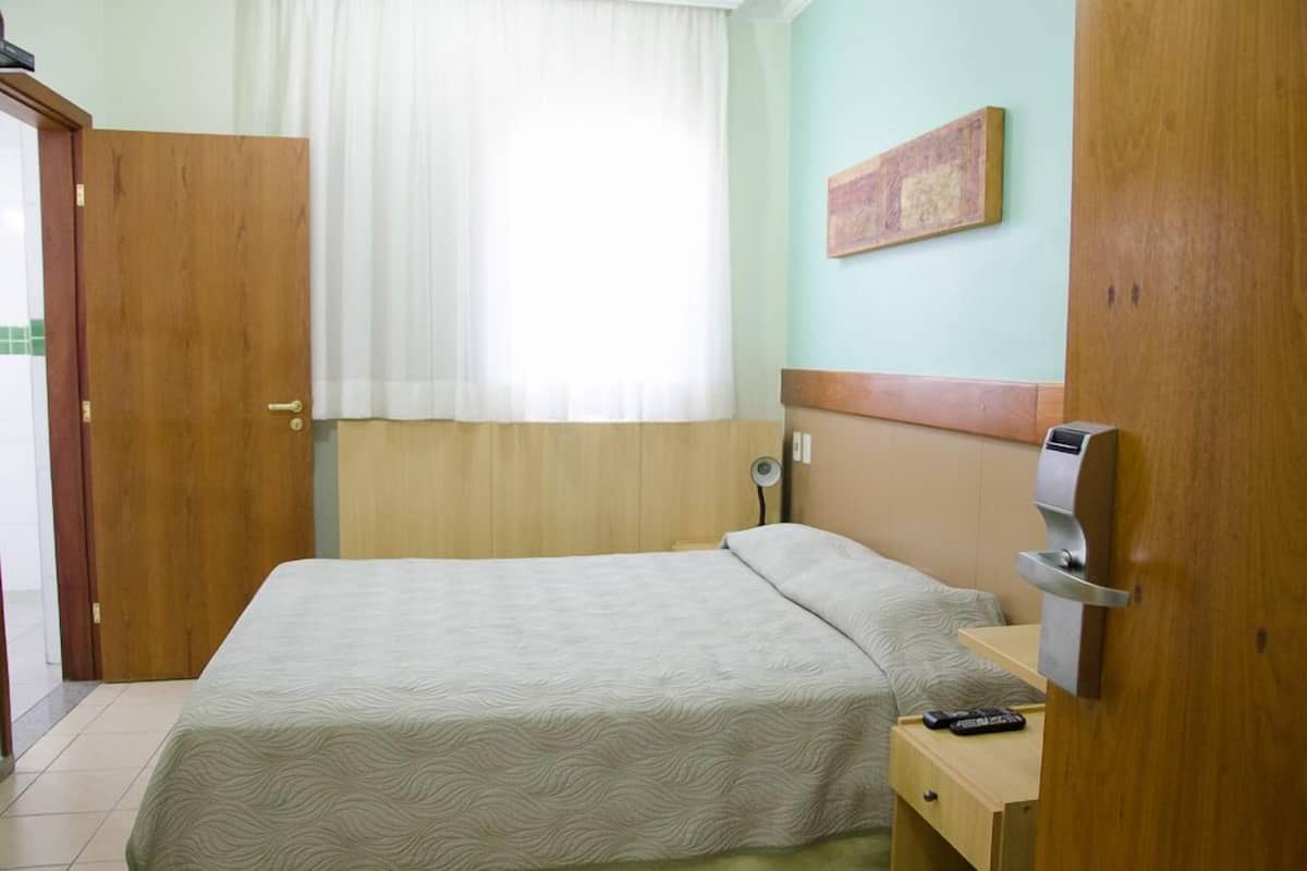 Double Room | Minibar, in-room safe, desk, blackout curtains