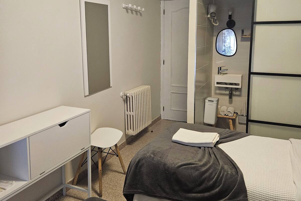 Desk, blackout drapes, iron/ironing board (on request), WiFi (free)
