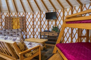 Room (Yurt, No Pets, Linens Available) | Living area | Flat-screen TV, DVD player, table tennis