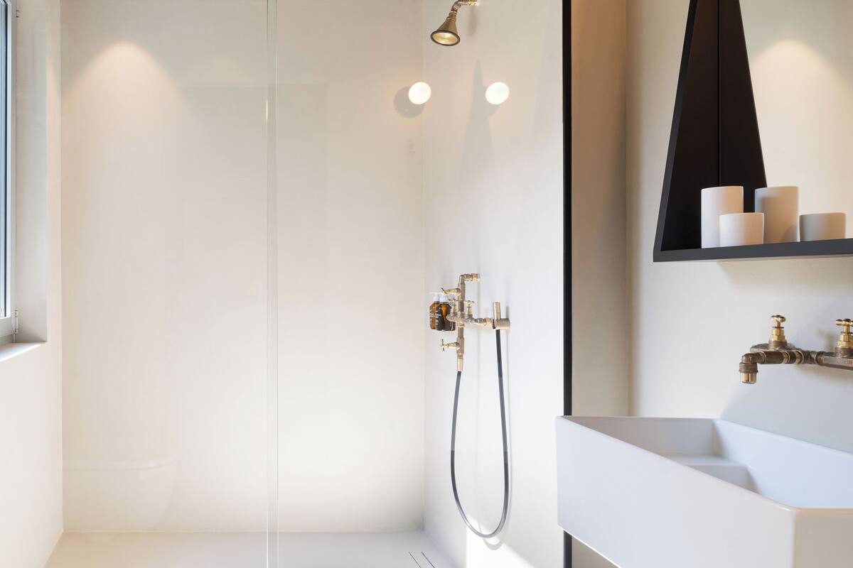 deluxe double room | bathroom | shower, eco-friendly toiletries, hair dryer, towels