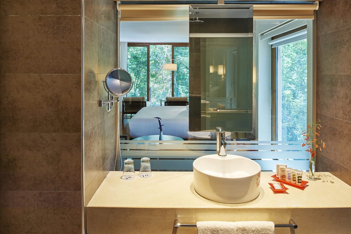 junior suite, 1 king bed with sofa bed | bathroom sink