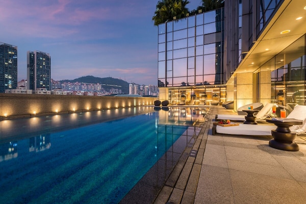 Outdoor pool, open noon to 9:00 PM, pool loungers