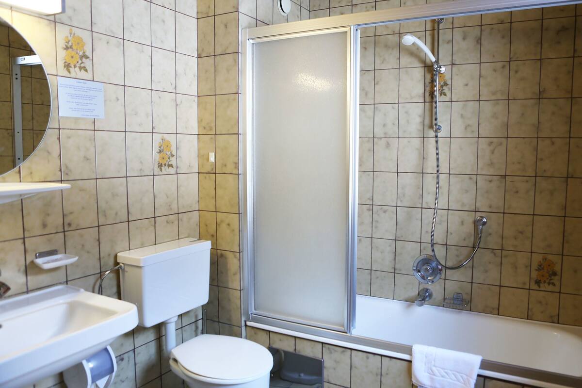 triple room, mountain view | bathroom | hair dryer, towels