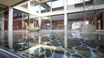 Contemporary space with a sleek, open layout and natural elements.
