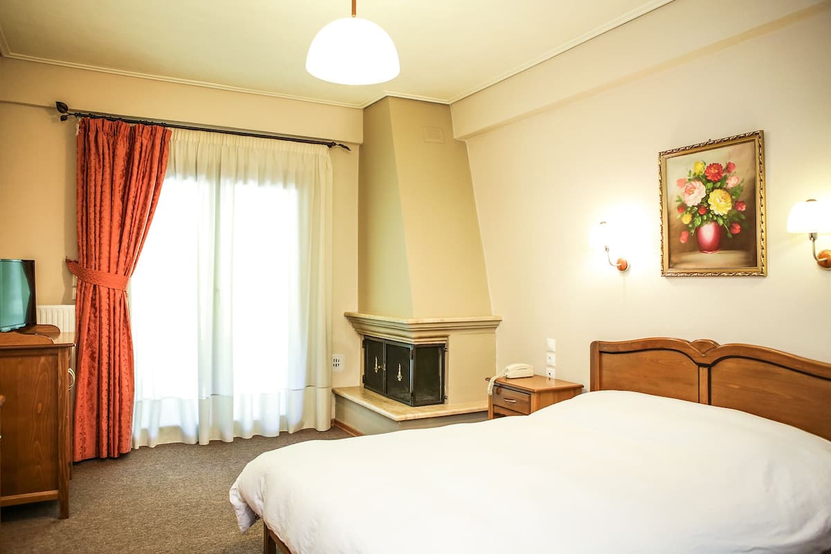 superior double room, fireplace | premium bedding, down duvets, in-room safe, desk