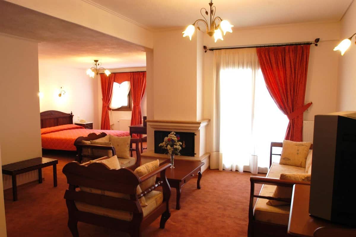 Studio Suite Eksekutif | Area keluarga | TV layar datar