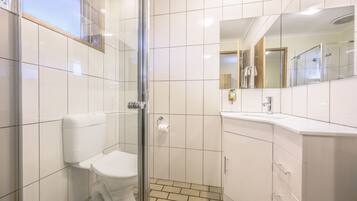 Shower, free toiletries, hair dryer, towels