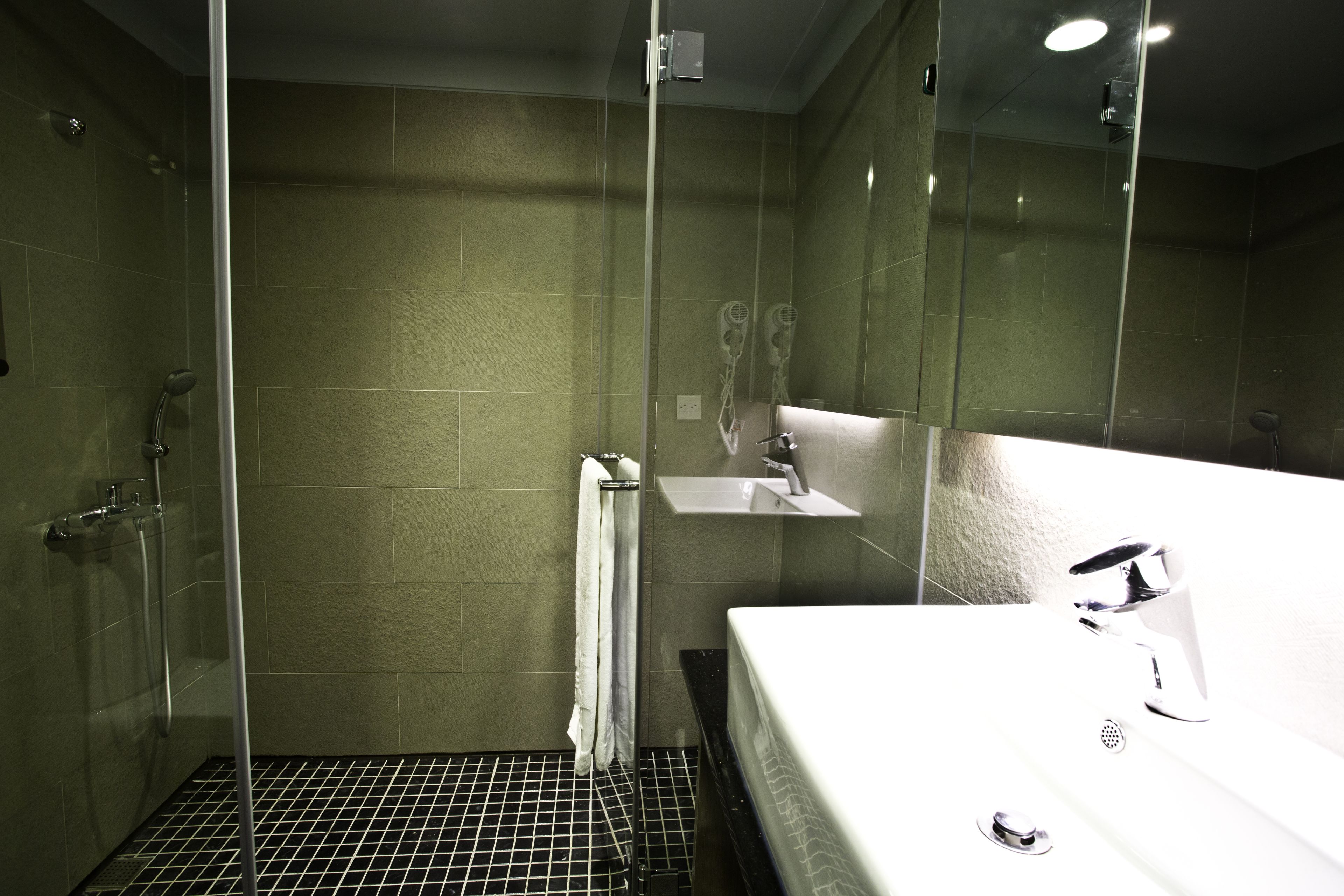 shower, free toiletries, hair dryer, slippers