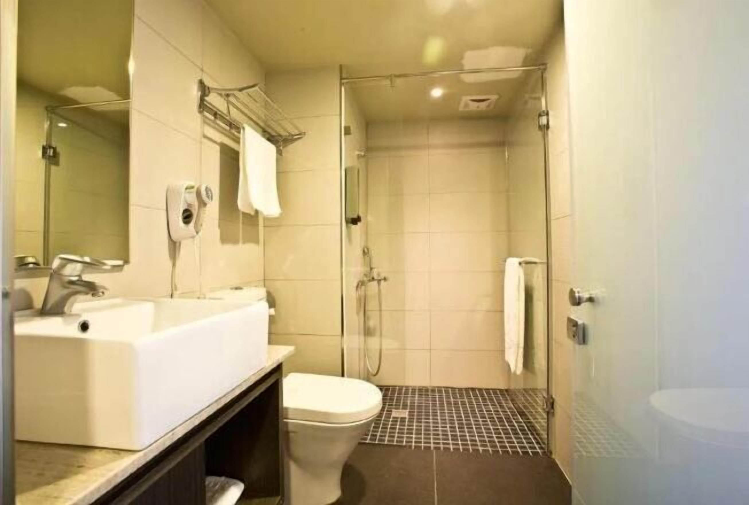 Bathroom | Shower, free toiletries, hair dryer, slippers