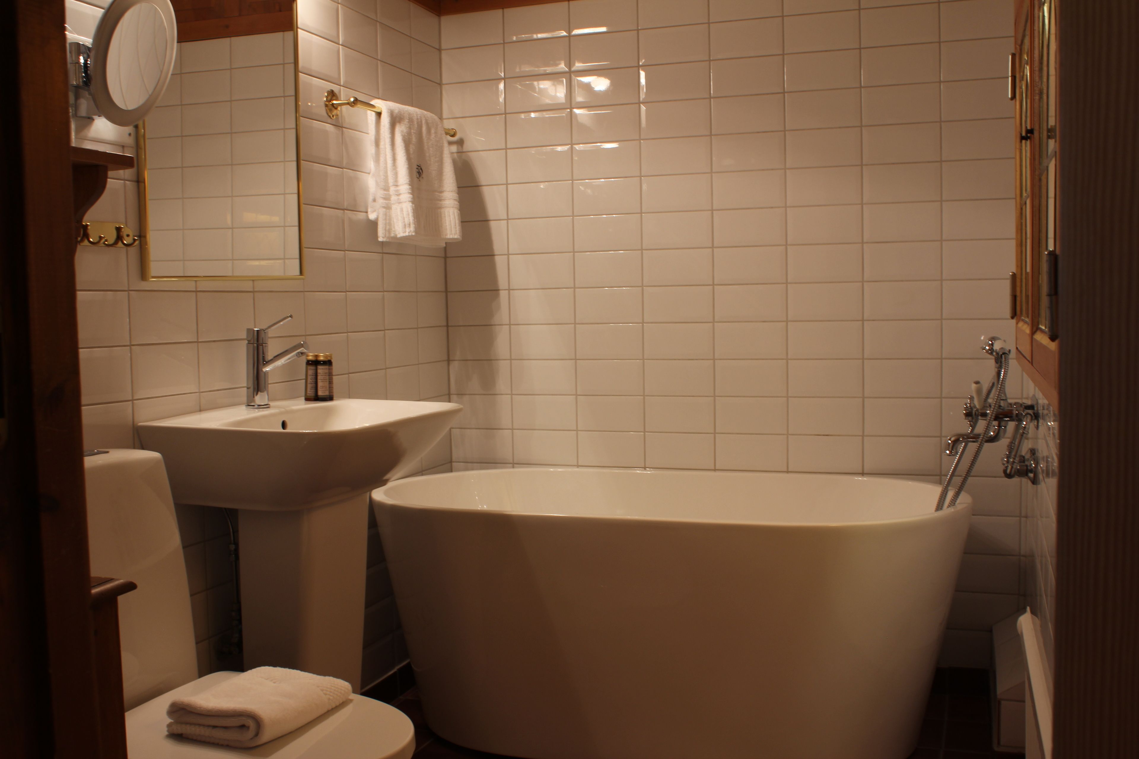 king suite with sea view | bathroom | hair dryer, towels