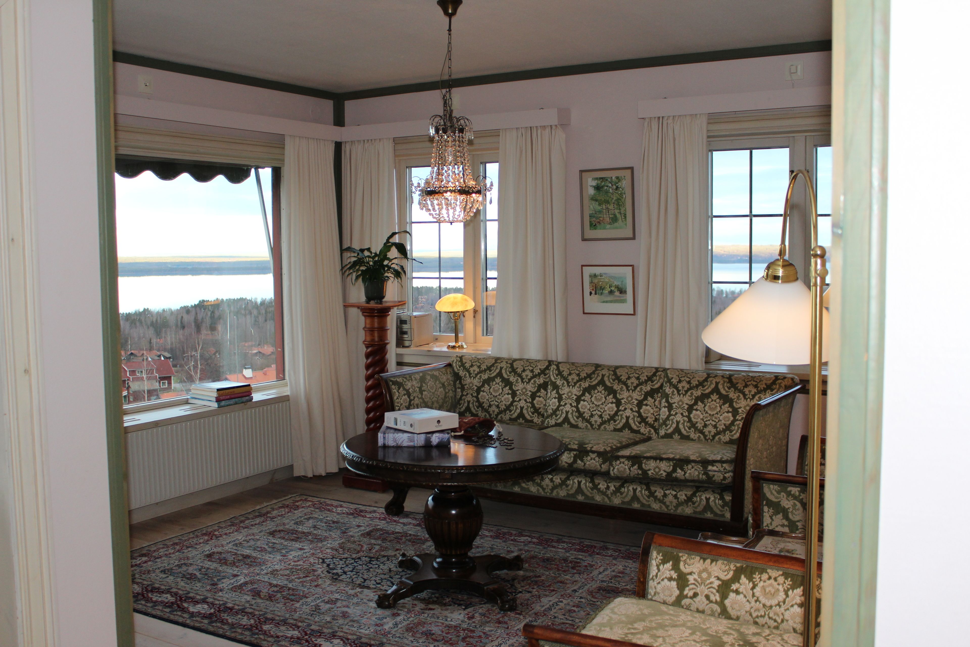 king suite with sea view | living room | 32-inch tv with cable channels