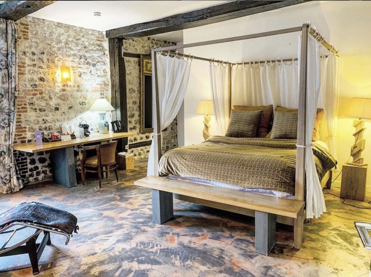 Deluxe suite, uitzicht op tuin | Luxe beddengoed, individueel gedecoreerd, individueel gemeubileerd