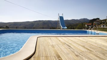 Seasonal outdoor pool, open 9:00 AM to 9:00 PM, sun loungers