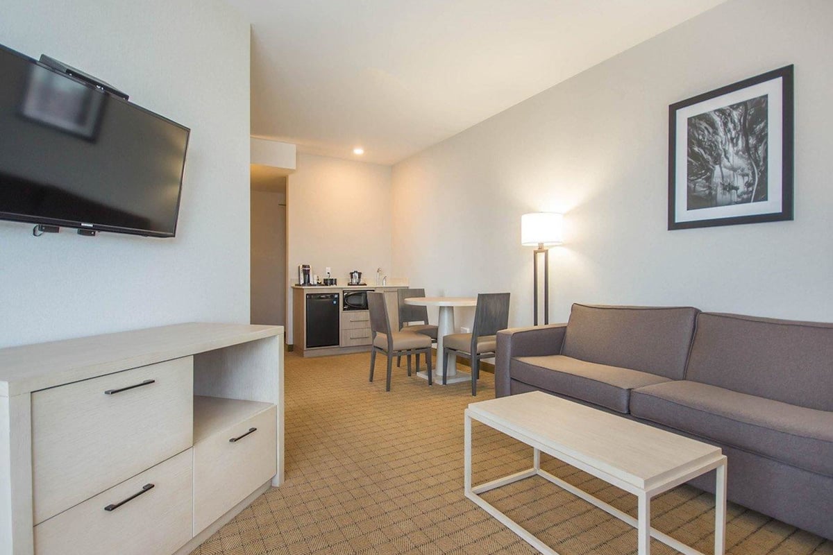 desk, blackout curtains, iron/ironing board, rollaway beds