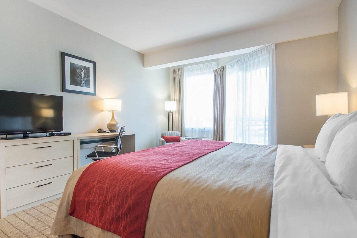 Desk, blackout curtains, iron/ironing board, rollaway beds