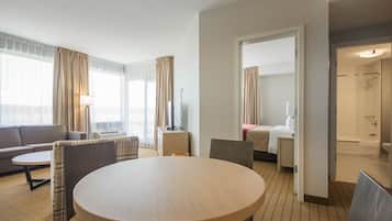 Desk, blackout drapes, iron/ironing board, rollaway beds