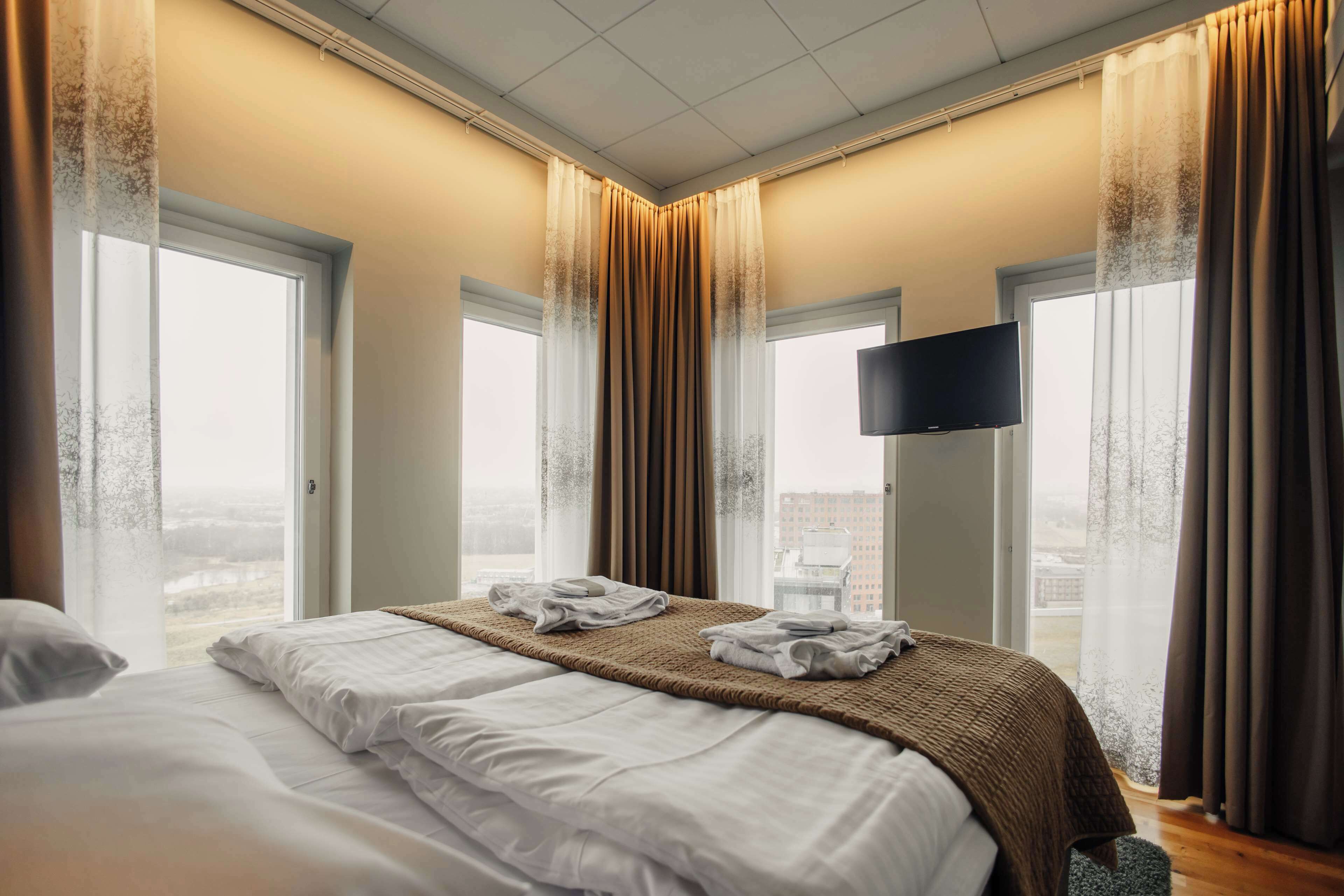 junior suite, 1 king bed, bathtub, sea view (living room) | in-room safe, soundproofing, cots/infant beds, free wifi