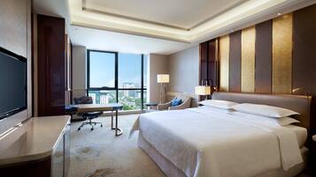 Premium bedding, down comforters, minibar, in-room safe