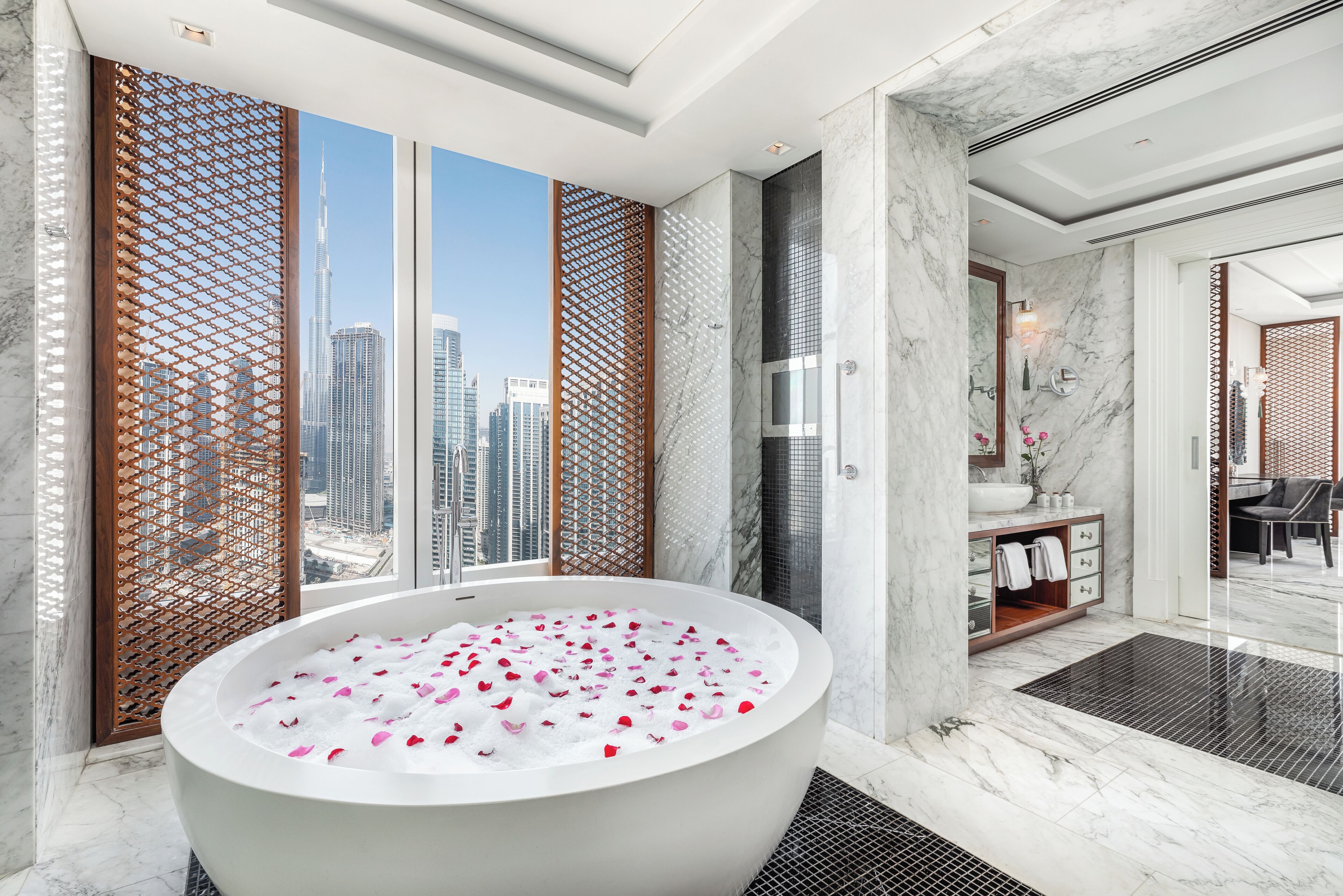 separate bathtub and shower, deep-soaking bathtub, designer toiletries