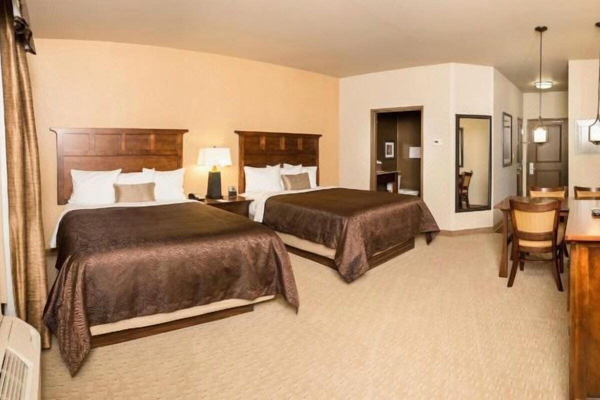 Desk, blackout curtains, iron/ironing board, rollaway beds