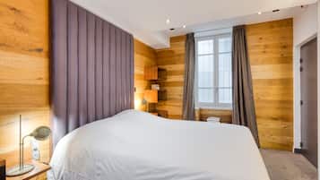 Quadruple Room | Premium bedding, desk, laptop workspace, blackout curtains