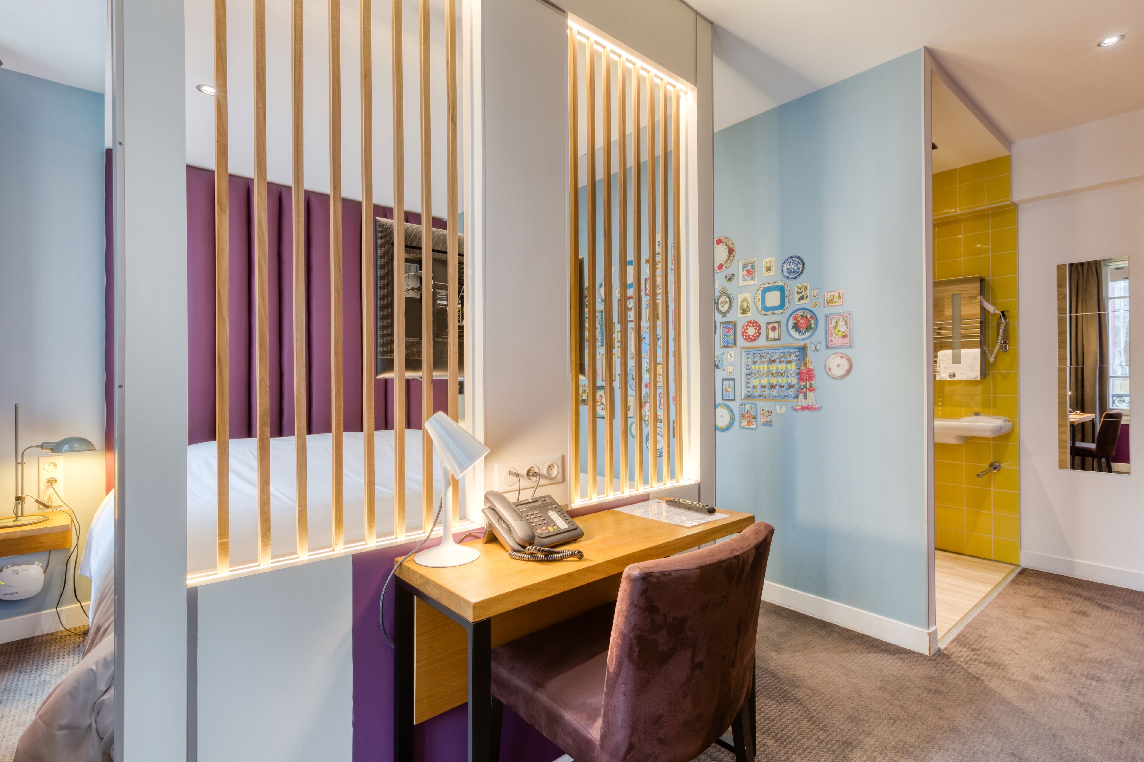 Premium bedding, desk, laptop workspace, blackout drapes