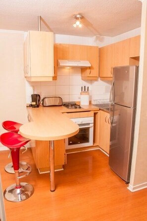 Apartment, 1 Bedroom | Private kitchen | Fridge, microwave, coffee/tea maker