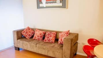 Departamento, 1 habitación | Área de sala de estar