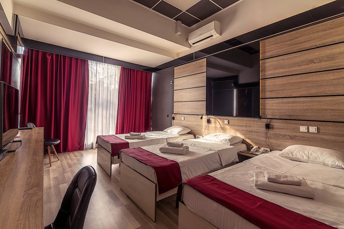 Superior Triple Room, City View | Frette Italian sheets, premium bedding, memory-foam beds, minibar