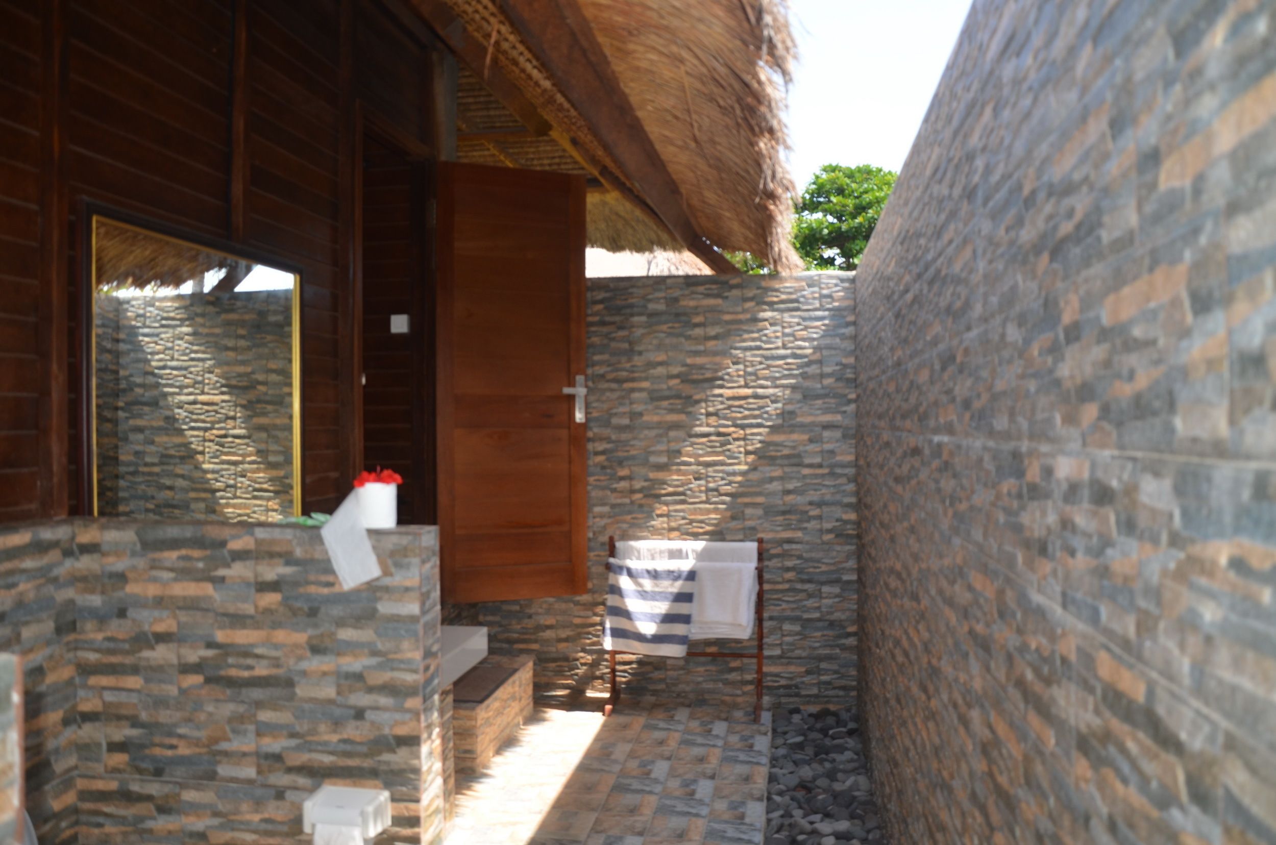 one bedroom bungalow pool view | bathroom | shower, dressing gowns, towels