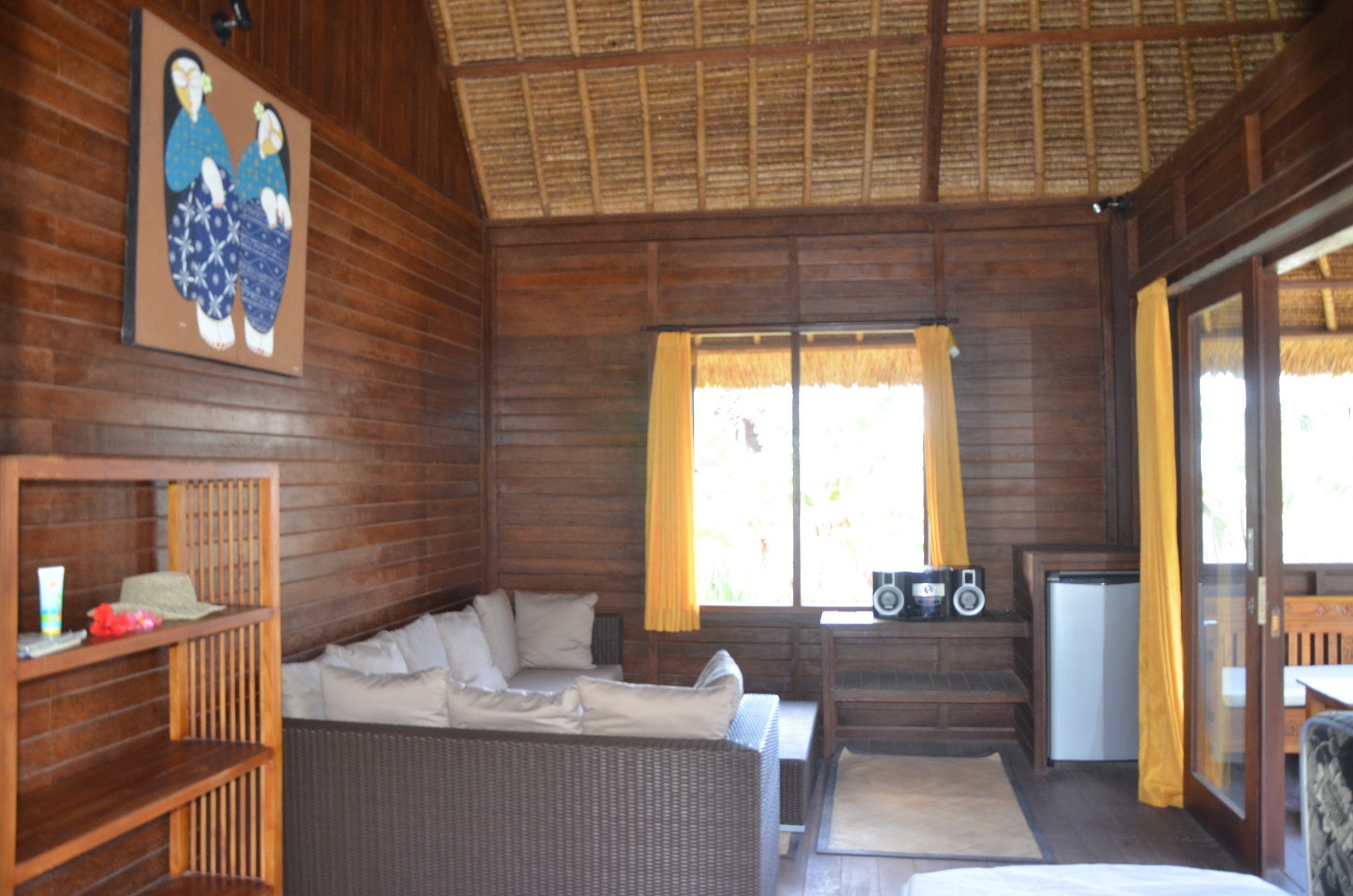 one bedroom bungalow pool view | living area