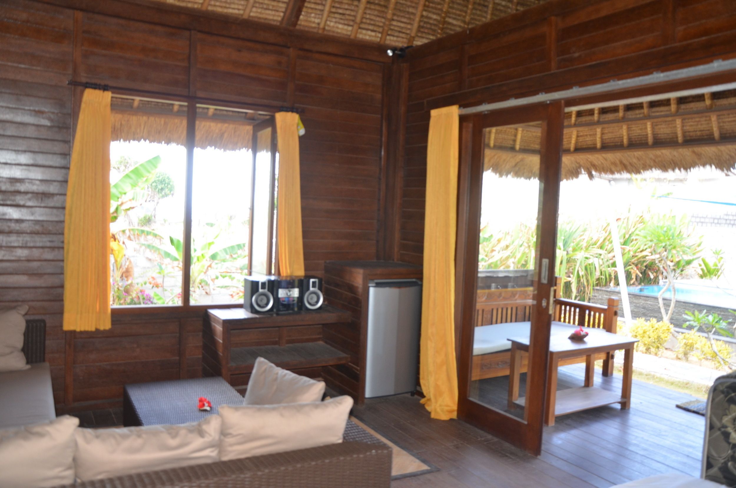 one bedroom bungalow pool view | living area