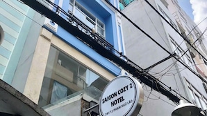 A hotel sign with the name "Saigon Cozy 2 Hotel" and address "241/12 Pham Nguy Lieu". - Saigon Cozy2 Hotel (Ho Chi Minh City)