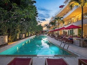 Outdoor pool, pool umbrellas, sun loungers