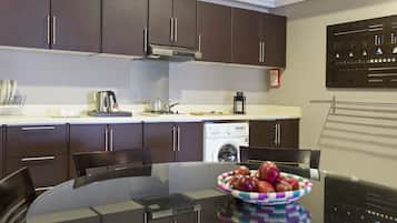 Fridge, microwave, stovetop, coffee/tea maker
