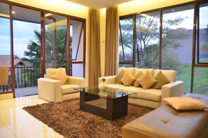 4 Bedrooms Villa with Private Pool | Living area | 40-inch flat-screen TV with digital channels, plasma TV - Ohara City View 5BR Villa Heated Pool and Billiard (Bandung)