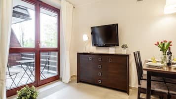 Apartment, 1 Bedroom, Kitchenette (Tetmajer 1) | Living room | Flat-screen TV