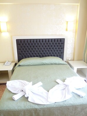 Standard Double or Twin Room | Minibar, in-room safe, desk, iron/ironing board