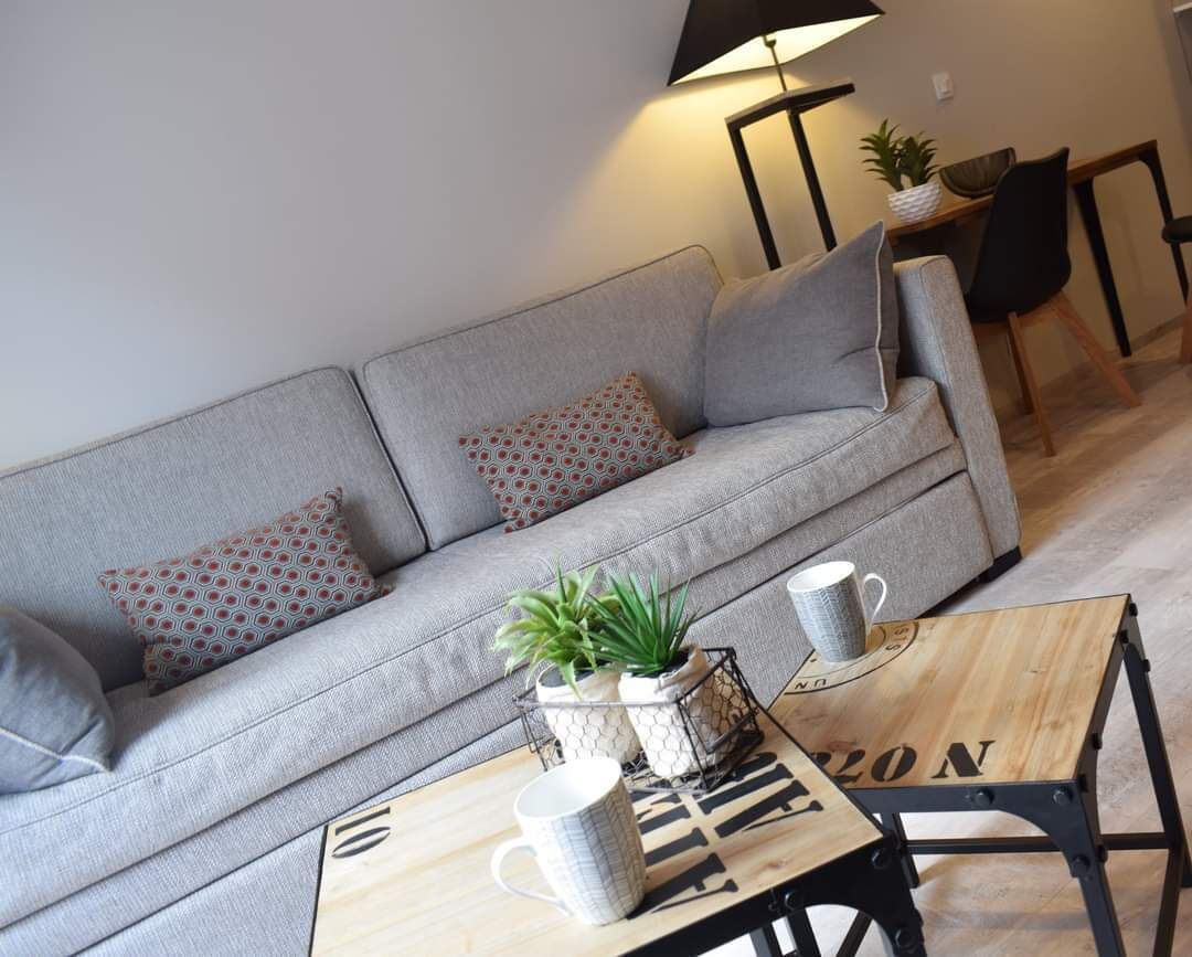 junior suite | living area | flat-screen tv