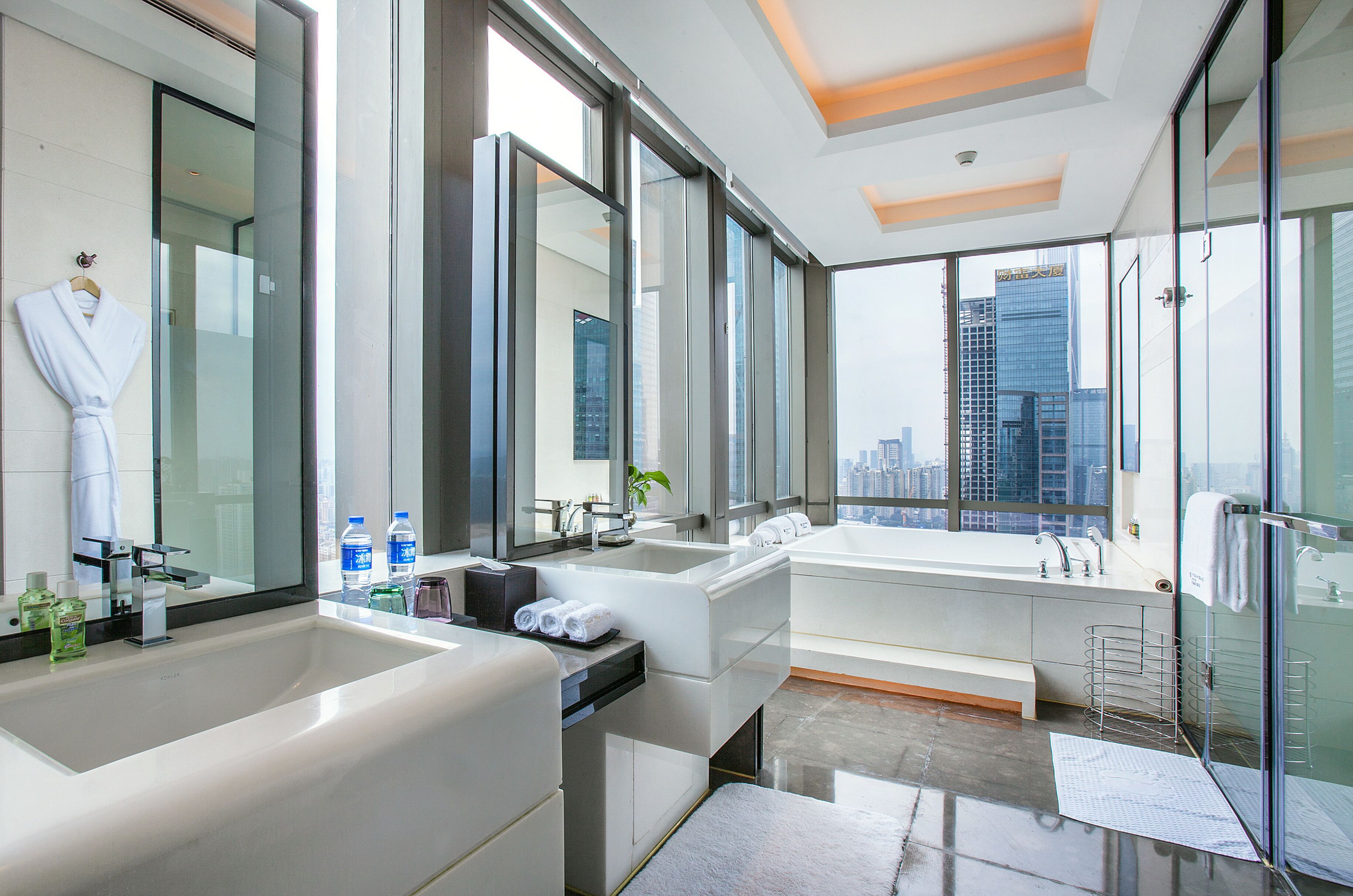 separate bathtub and shower, deep-soaking bathtub, rainfall showerhead