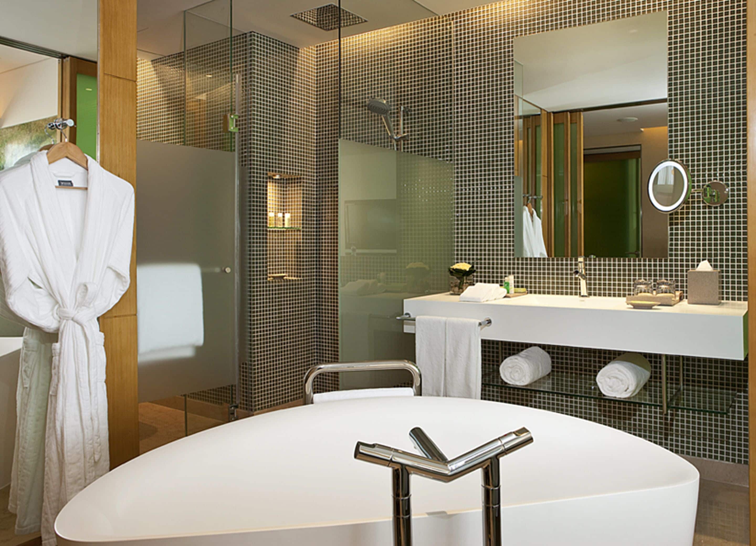 separate bathtub and shower, deep-soaking bathtub, rainfall showerhead