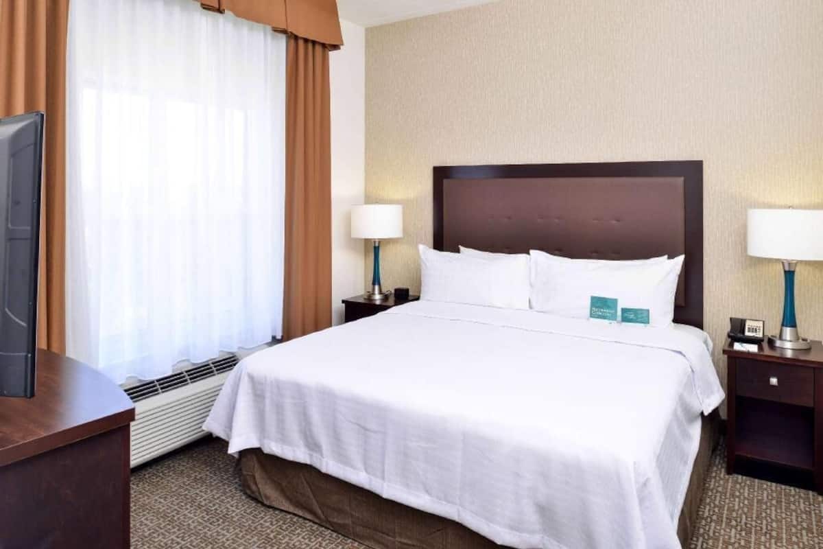 Premium bedding, down duvets, pillow-top beds, in-room safe